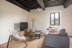 Pepoule - Appartements avec vue sur les monts du Beaujolais : photos des chambres