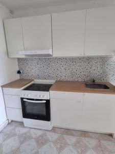 Appartements Appart Grand Paris Stade France Sites Olympiques : photos des chambres