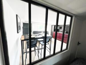 Appartements 2 pieces cosy a 15 min de Paris : photos des chambres