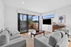 Boardwalk on Bright Coastal Apartment