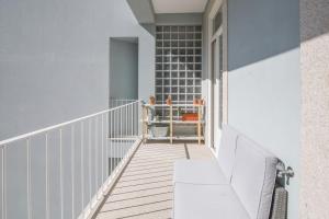 Central location with balcony & equipped kitchen