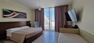 Junior Suite mit Terrasse und Meerblick.