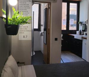 Family Room Private Bathroom and Kitchenette room in Barcelona Rooms 294
