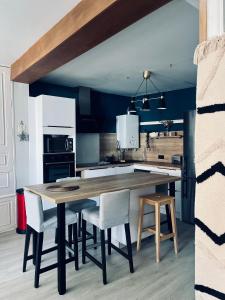 Appartements L-Haussmanien au Coeur de ville : photos des chambres