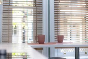Verulum Apartments - 9 mins walk to the beach - Beautifully Designed Luxury Town Centre Apartments by Coastline Retreats
