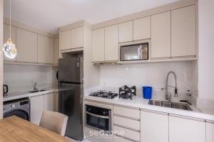 Apto Vista Mar c churrasq. em Itapema SBN0705