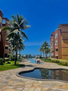 Flat em resort - pé na areia, Camboinhas