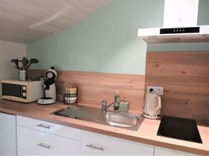 Appartements Le P-tit Gite d-Isa, 15 km du Puy du Fou : photos des chambres