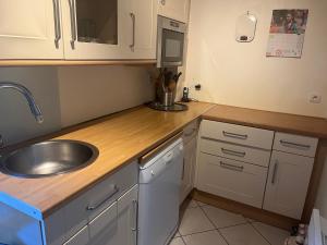 Appartements La roseraie : photos des chambres