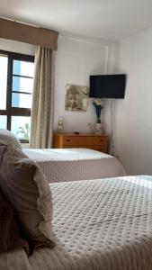 Sun&Relax Apto 2dormitorios 6-7pWifi&Piscina