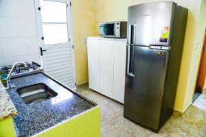 Casa a 950m da Praia Martim de Sa - Caraguatatuba