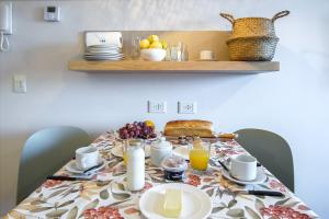 Otto con vista al lago