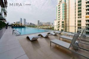 Mira Holiday Homes - Lovely serviced apartment with pool access