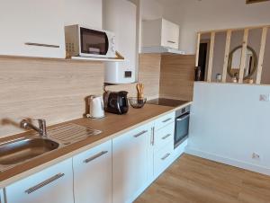 Appartements Le Panoramique - T2 46m² - Proche centre-ville et gare : photos des chambres