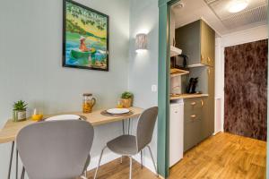 Appartements Studio Victoria BOHO, au coeur du centre ville : photos des chambres