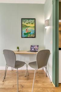 Appartements Studio Victoria BOHO, au coeur du centre ville : photos des chambres