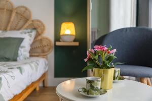 Appartements Studio Victoria BOHO, au coeur du centre ville : photos des chambres