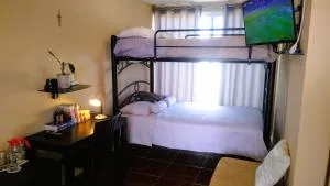 Habitacion con dos camas dobles y baño propio - Lomas de Angelopolis