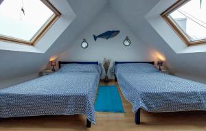 Maisons de vacances 3 Bedroom Stunning Home In Groix : photos des chambres