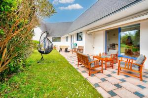 Maisons de vacances Piscine couverte - sauna - Maison pour 9 a Loctudy : photos des chambres