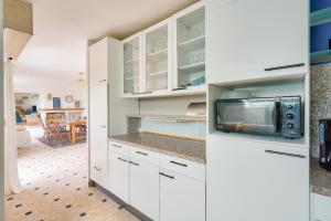 Maisons de vacances Piscine couverte - sauna - Maison pour 9 a Loctudy : photos des chambres