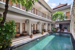 Angkul Angkul Segara Beach Kuta by Kamara