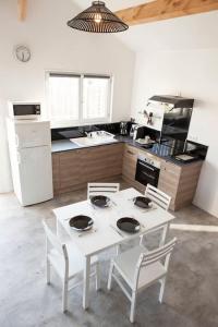 Chalets L'atelier, chalet proche lac et ocean a Hourtin : photos des chambres