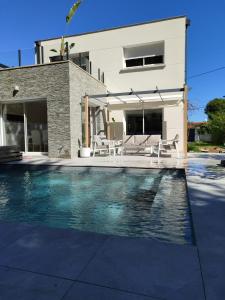 Villas Maison contemporaine : photos des chambres