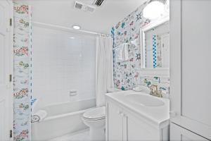 Ground floor beachfront with steps to the beach and pool & beach access