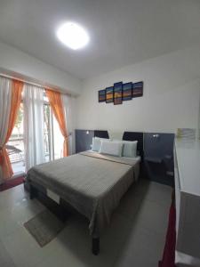 Beach condos at Pico de Loro Cove - Wi-Fi & Netflix, 42-50TVs with Cignal cable, Uratex beds & pillows, equipped kitchen, balcony, parking - guest registration fee is not included