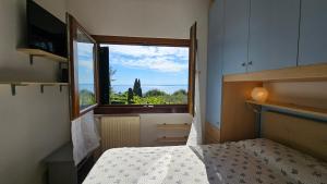 APARTMENTS BLUE VIEW - Residence Casetto Bardolino - Regarda Travel