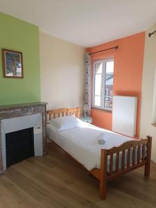 Appartements Maison au coeur du village avec parking : photos des chambres