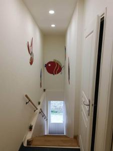 Appartements Maison au coeur du village avec parking : photos des chambres