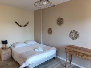 Appartements Maison au coeur du village avec parking : photos des chambres