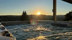 Wellnorama 1 - WellnessFerienhaus mit Pool, Sauna und eigenem Whirlpool mitten in Deutschland - Schwallungen