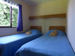Maisons de vacances Well-equipped mobile home with garden in Normandy : photos des chambres