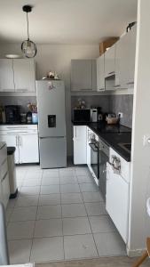 Appartements Apparentement proche Paris avec terrasse vue degagee : photos des chambres