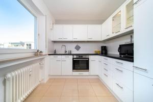 City Apartment mit Sonnenbalkon, 10 Minuten zum Bahnhof, 5 Minuten zum Luisenviertel