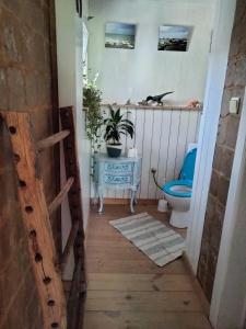 De oude smidse - tuinkamer