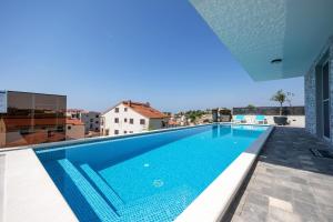 Apartman Oliva and Studio Delux for a family with swiming pool, free parking, terace with view at the sea