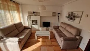 Chalet Adosado con jardín - Cóbreces