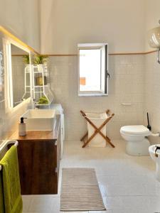 Casetta Bianca con Giardino img15