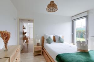 Appartements Charmant 2 pieces avec Terrasse Proche Transport : photos des chambres