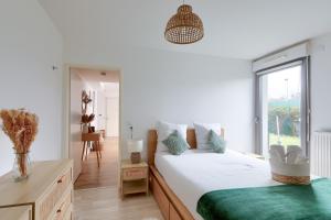 Appartements Charmant 2 pieces avec Terrasse Proche Transport : photos des chambres
