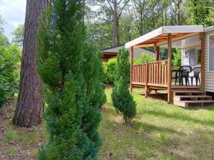 Maisons de vacances Bungalow charmant avec piscine partagee a Saint-Cheron : photos des chambres