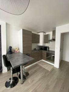 Appartements Le Cottage Apaisant : photos des chambres
