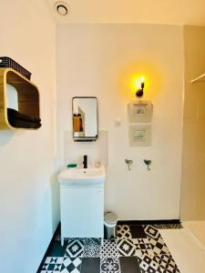 Appartements Jolie maison avec jardin au calme en ville : photos des chambres