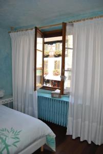 Appartements & Chambres Les Loges du Capucin : photos des chambres