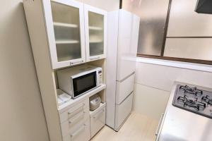 JR西九条徒歩4分！最大12名宿泊可能！貸切一軒家！USJ、梅田アクセス良好！１F広々リビングあり！