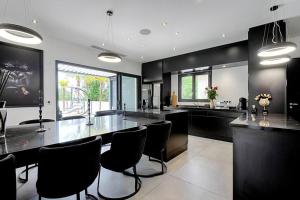 Villas Villa Vice City -proche Eurexpo/Groupama stadium/LDLC Arena : photos des chambres